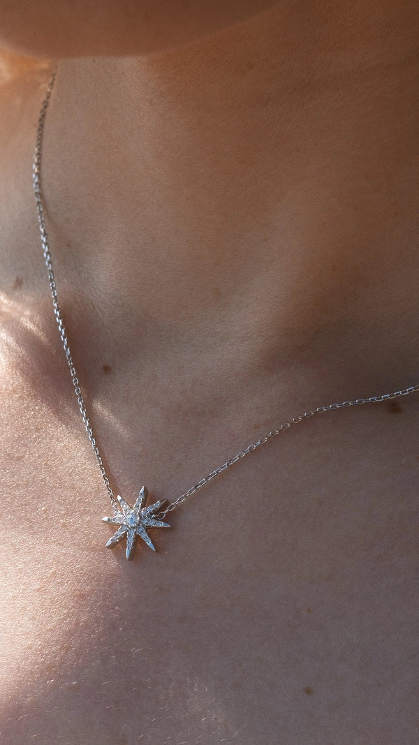 Elegant silver necklace for women with star pendant close-up
