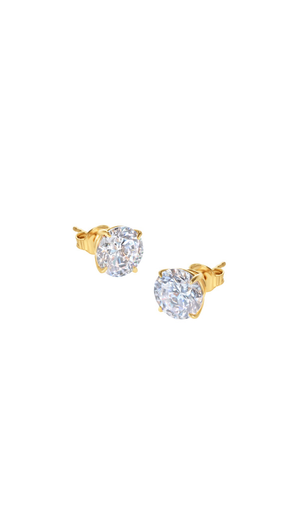 Classic solid gold four prong stud earrings for women.