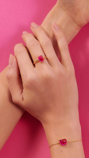 Dark pink lab-grown stone in sugarloaf cut on a sterling silver ring for women with gold vermeil. Part of the sugardrop collection