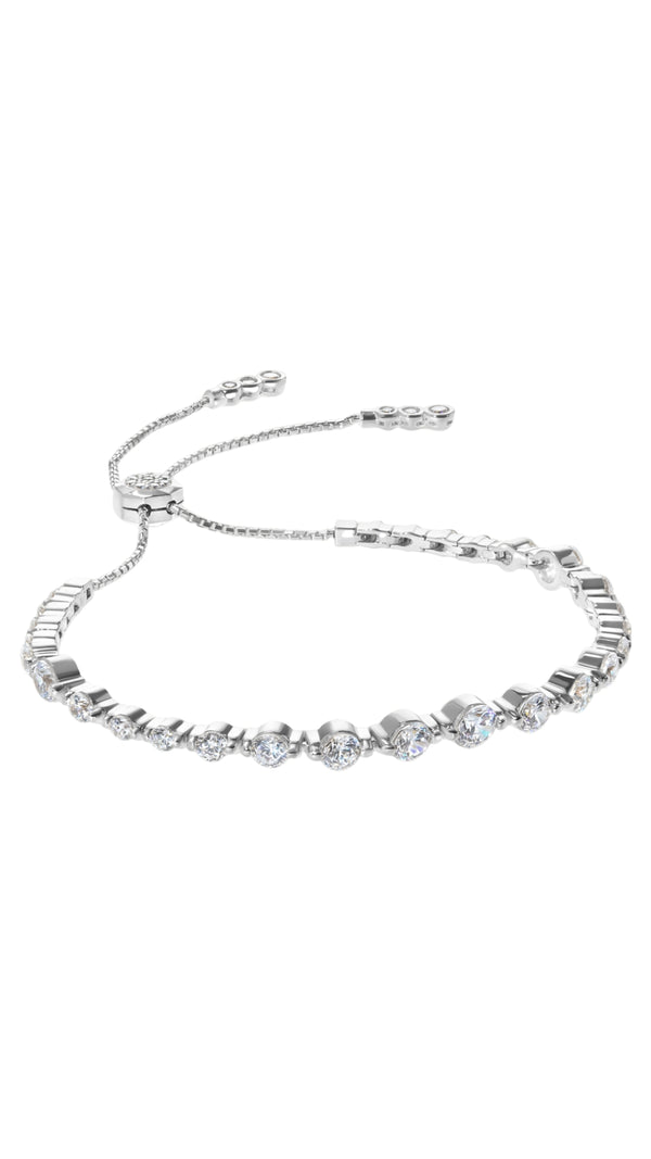Sterling silver tennis bracelet for women featuring varying sizes of Round Brilliant cut stones, Grace is a modern take on the traditional tennis bracelet.