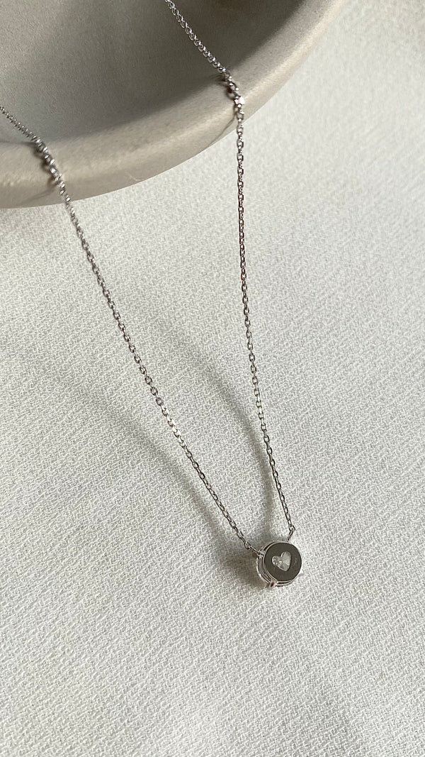 18k solid gold lab grown diamond for women with heart design on the back.