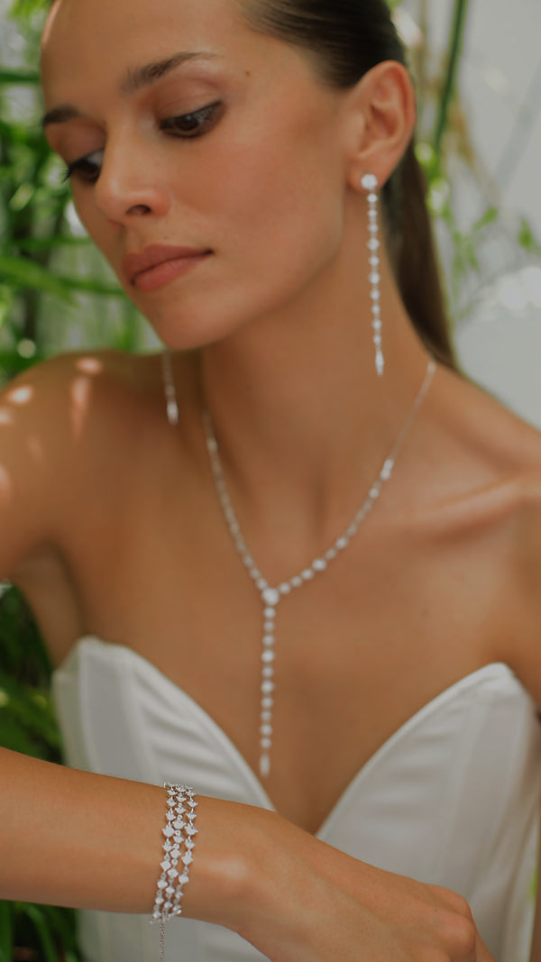 Sterling silver slider bracelet in Phoenix design paired with Phoenix drop necklace and drop earrings