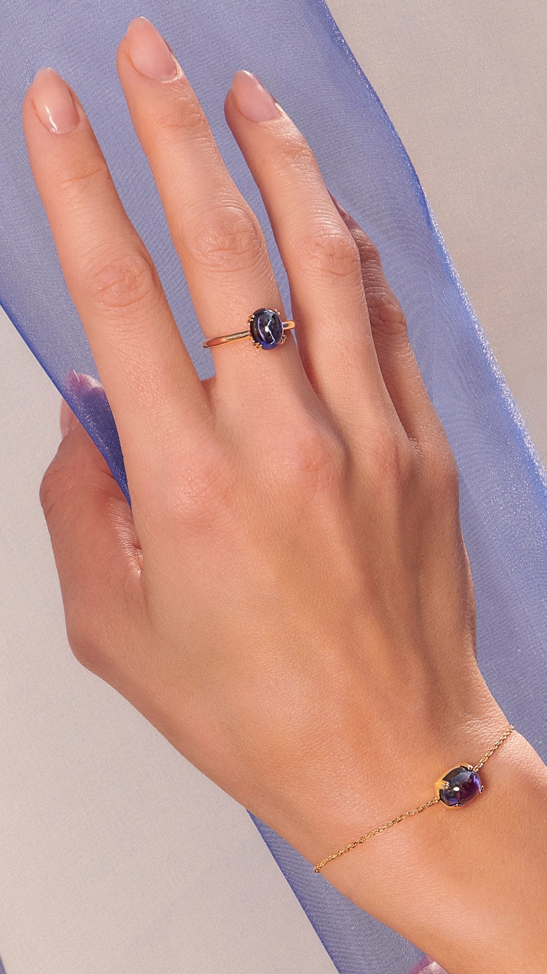 Recycled tanzanite cabochon stone gold vermeil ring and slider bracelet for women from the sugardrop collection