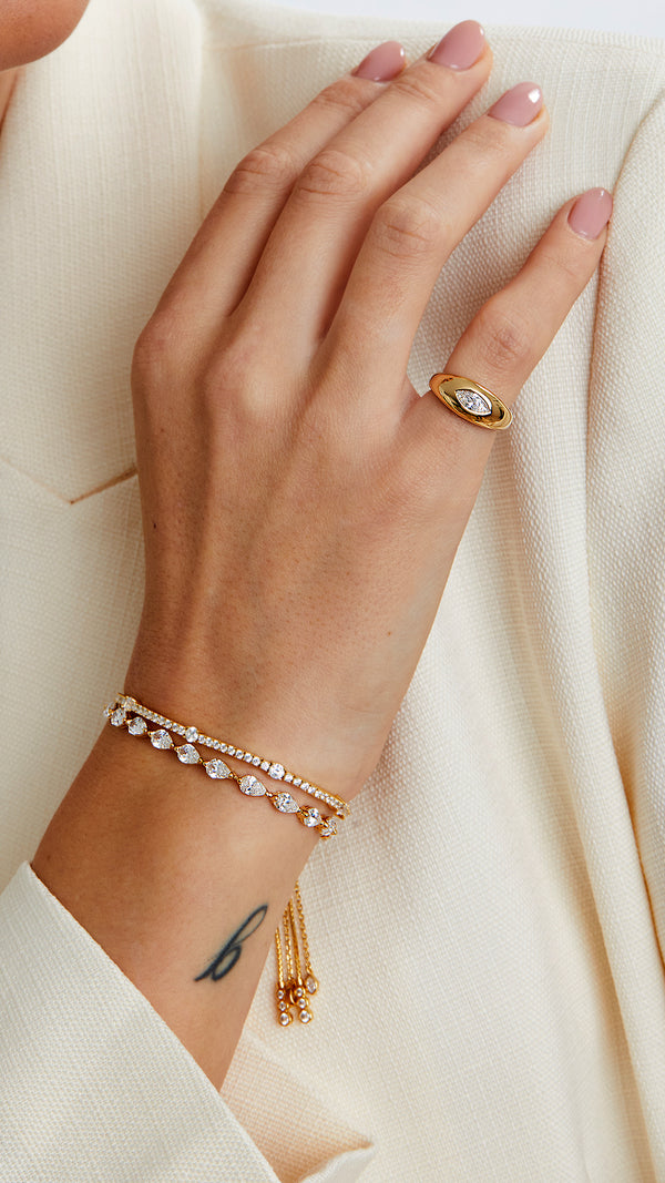 18K gold vermeil stacking tennis bracelets paired with gold signet ring for women