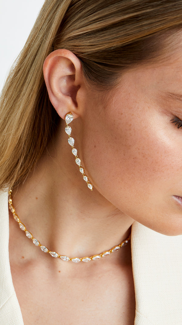Statement gold vermeil necklace with pear-shaped gemstones. Elevate your evening look with this adjustable piece.