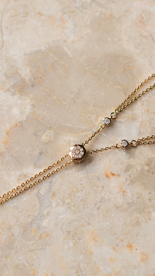 Gold vermeil necklace adjustable slider for a pre-layered tangle free necklace.