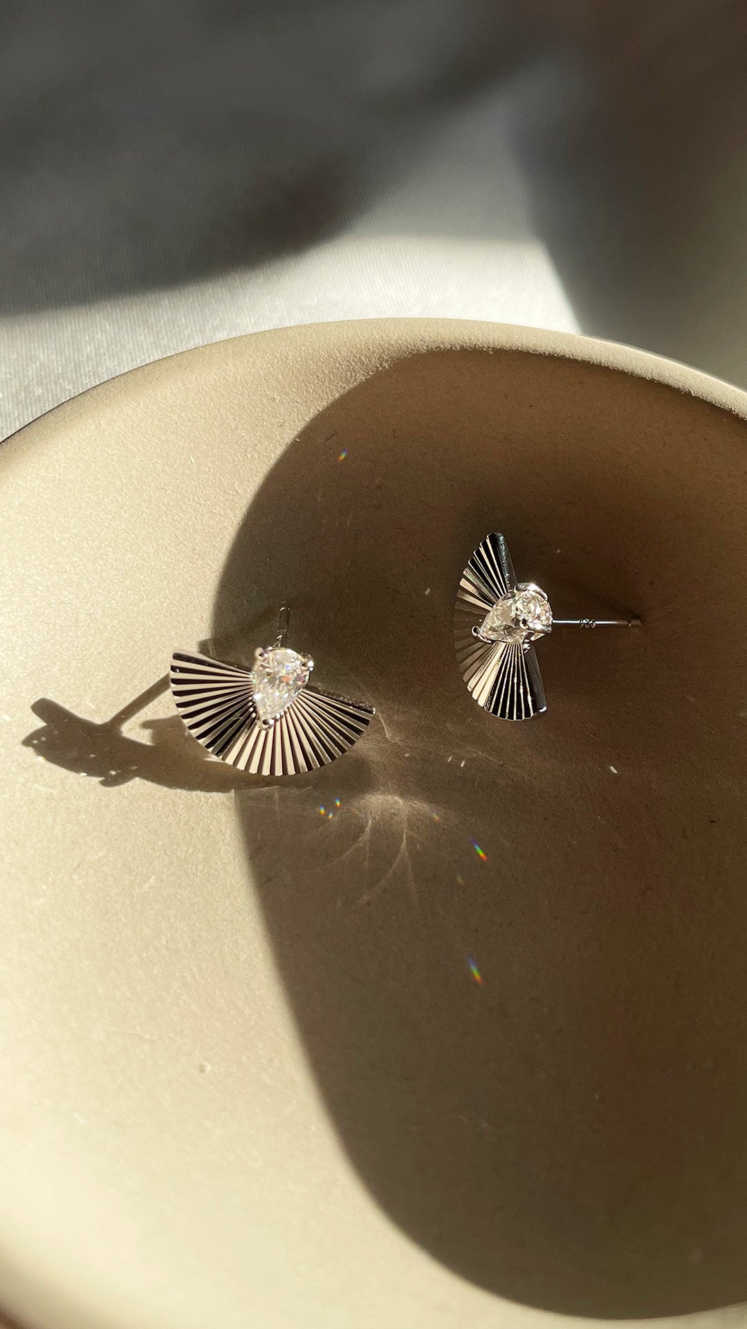 White sales fan earrings