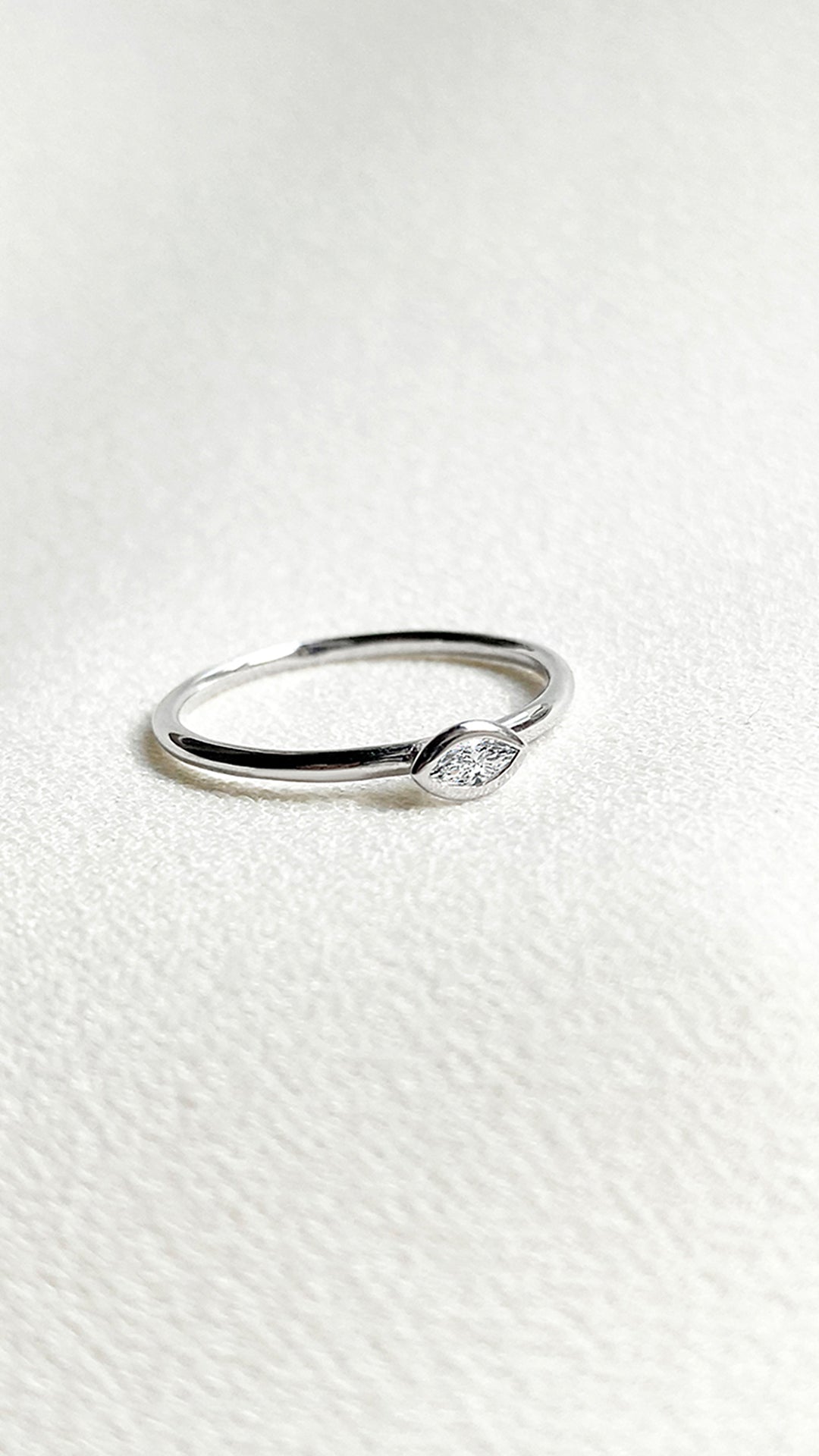 Polished 9K solid white gold everyday ring with a sparkling lab diamond