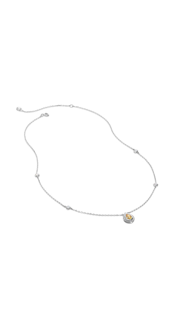 Classic sterling silver border set yellow pear cut gemstone station necklace for women.