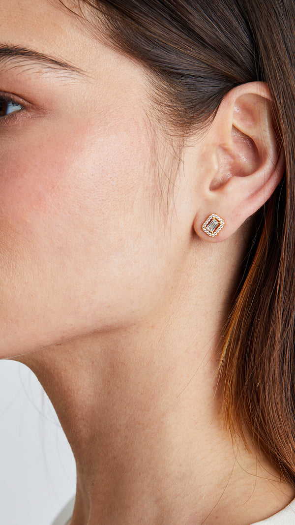 These emerald cut stud earrings, designed with a delicate border, present a minimalist stud earring option, perfect as fine jewellery for any occasion.