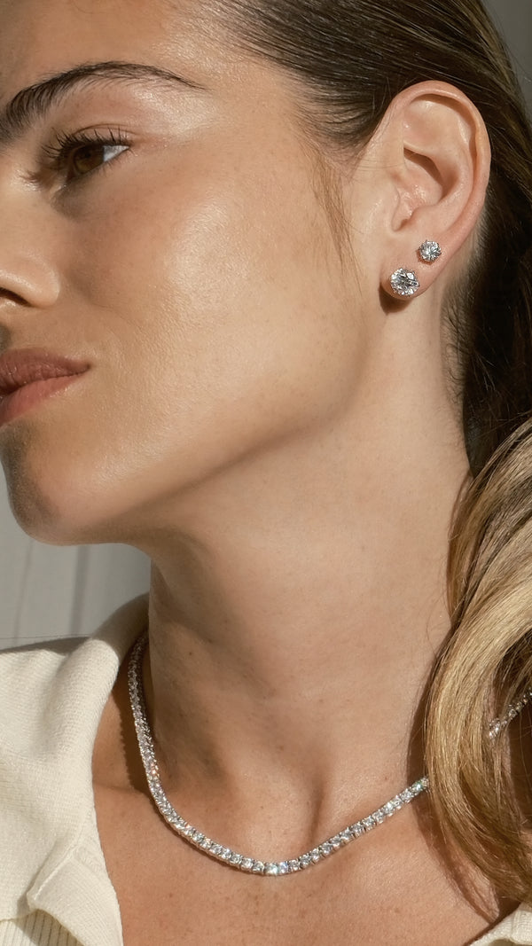 Fiona stud earrings in 1ct and 2ct sizes with a sparkling tennis necklace.