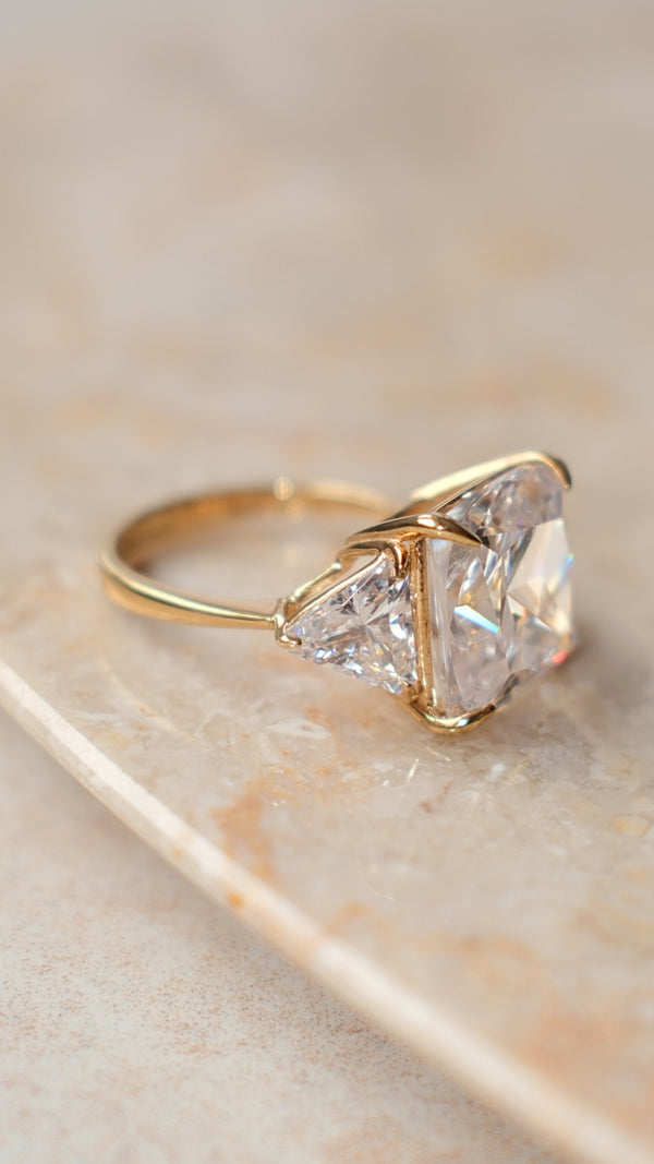 Gold vermeil band with a large central stone and two smaller triangular side stones