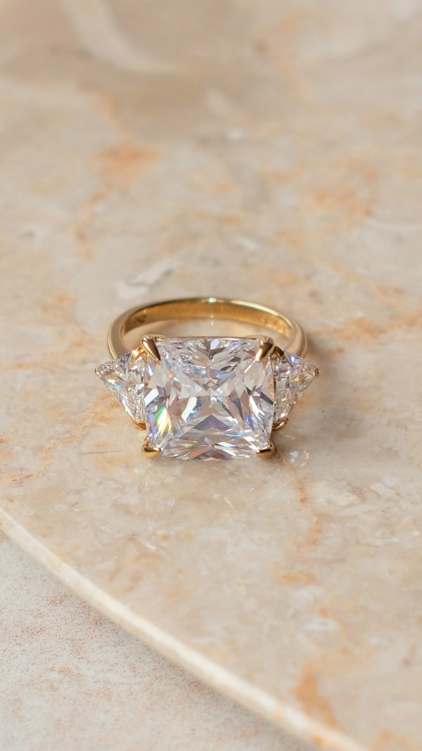 Close-up of the gold vermeil Gemma cocktail ring with a sparkling cushion cut stone