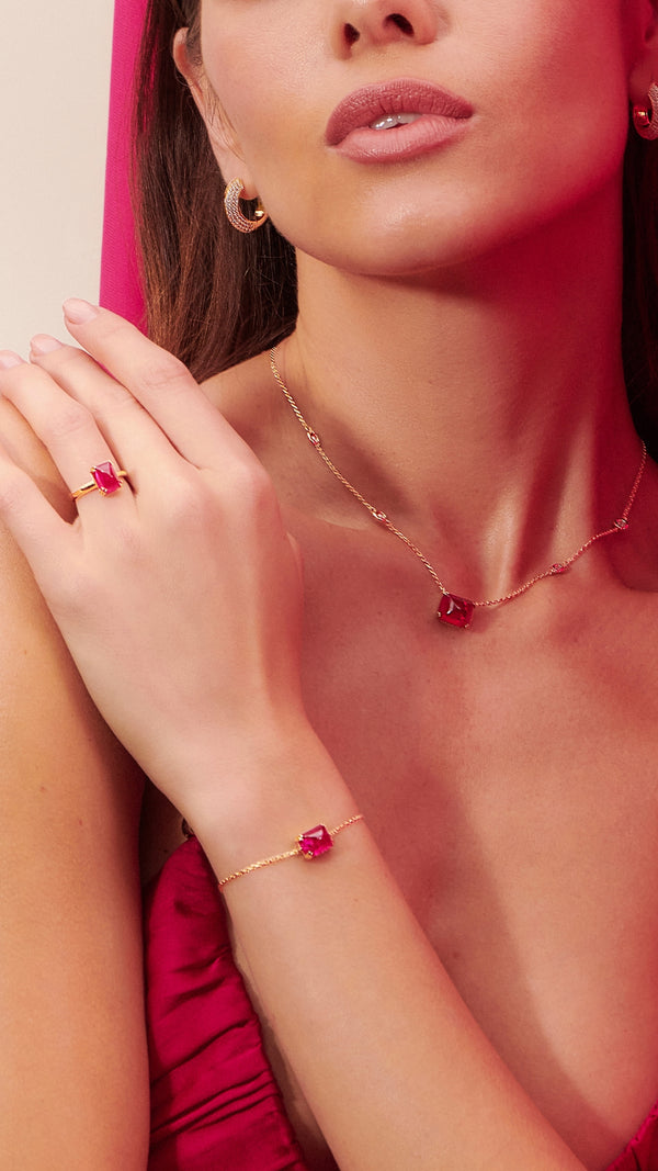 Gold vermeil slider bracelet, solitaire ring and gold station necklace with lab-grown ruby stone