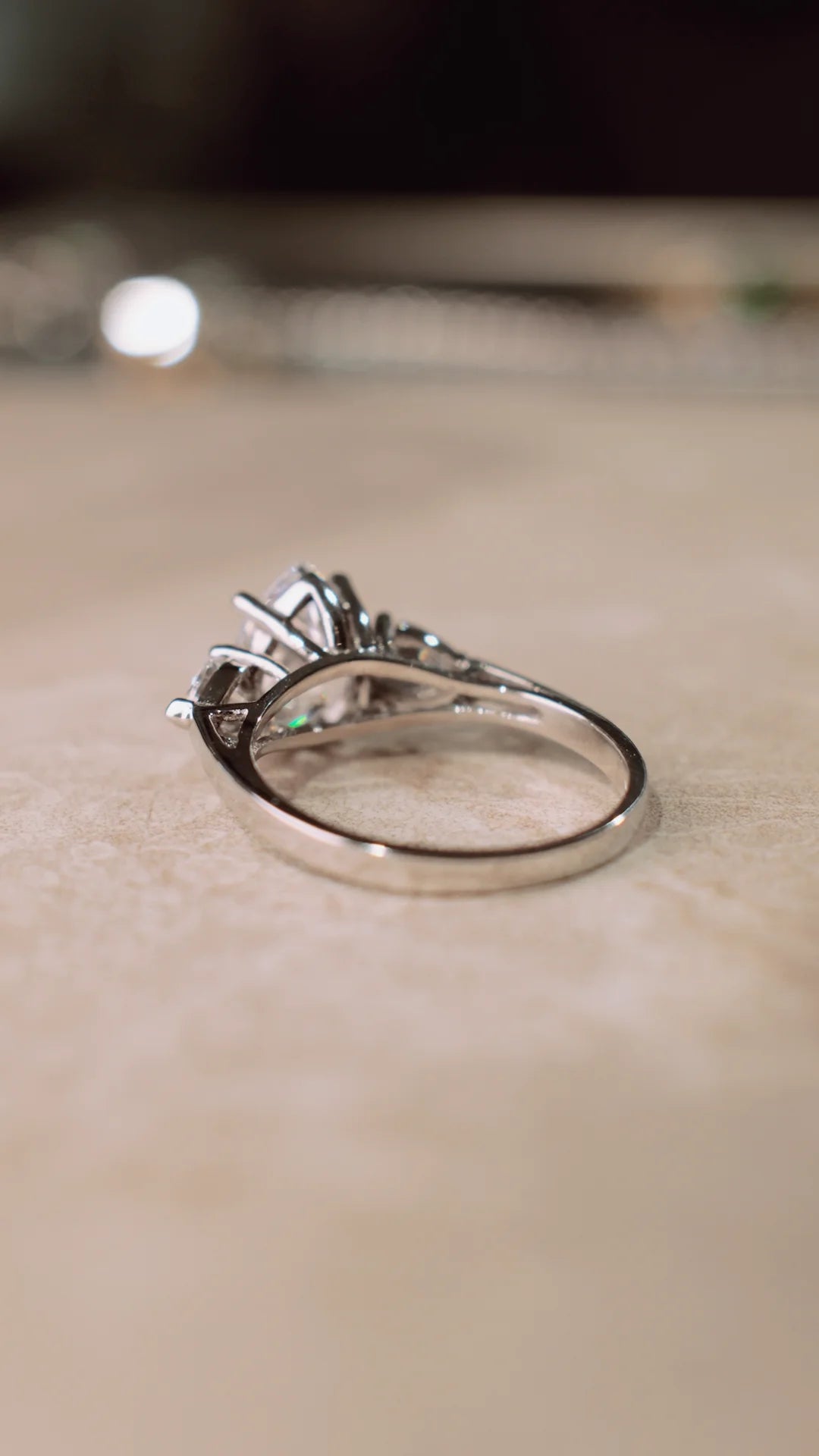 9K solid white gold ring with pear cut centre stone.