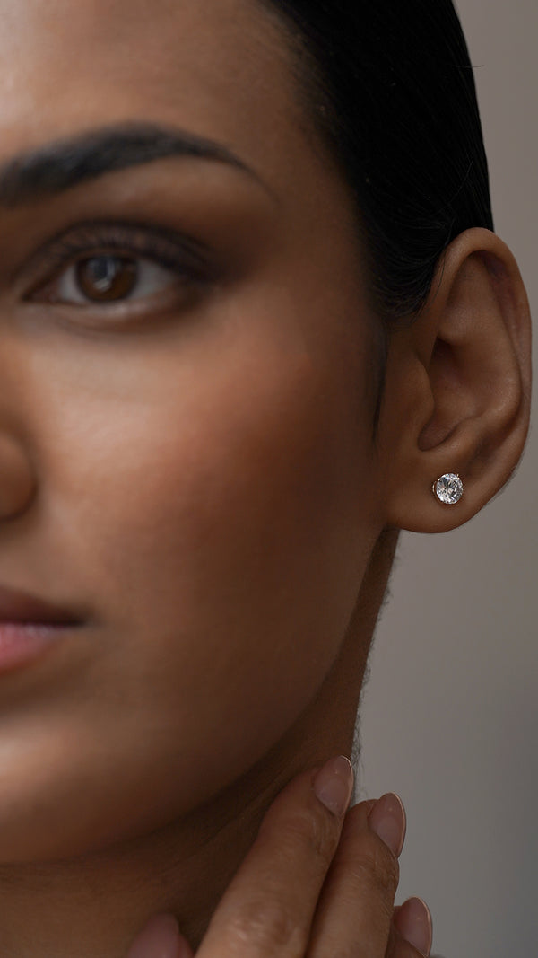 Classic pair of lab grown diamond stud earrings in 18K yellow gold.