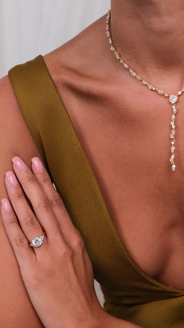 A baby cocktail ring in gold vermeil styled with a statement necklace