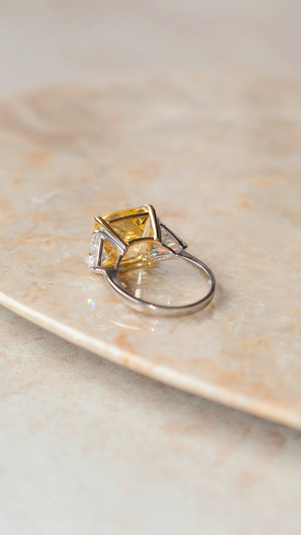 Back view of sterling silver ring featuring a light yellow Flanders cut stone.