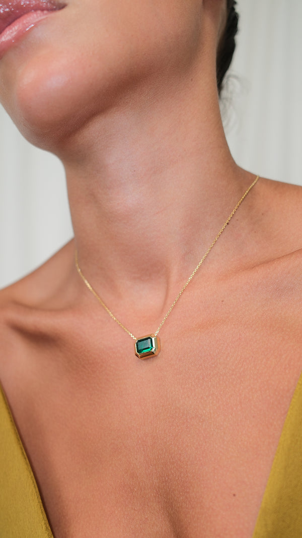 Close-up of the Lily emerald keystone necklace in 18K gold vermeil