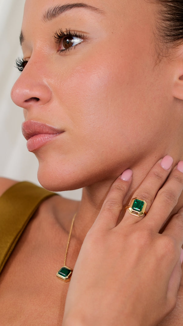Wedding guest jewellery idea: Emerald green statement ring in gold vermeil with matching necklace.