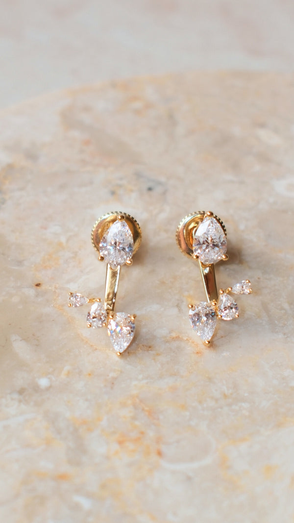 Versatile gold vermeil on sterling silver earrings with detachable ear jackets, wearable as simple pear studs or statement drops