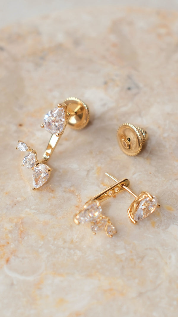 Versatile  earrings with detachable ear jackets, wearable as simple pear studs or statement drop earrings