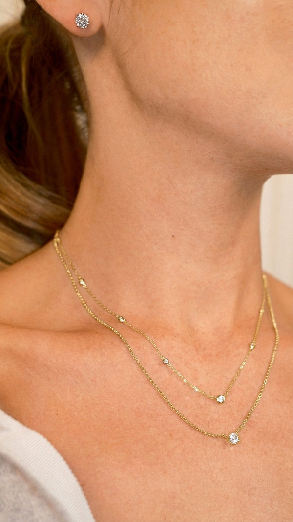 Elegant gold vermeil solitaire pendant with pre-layered station chain.