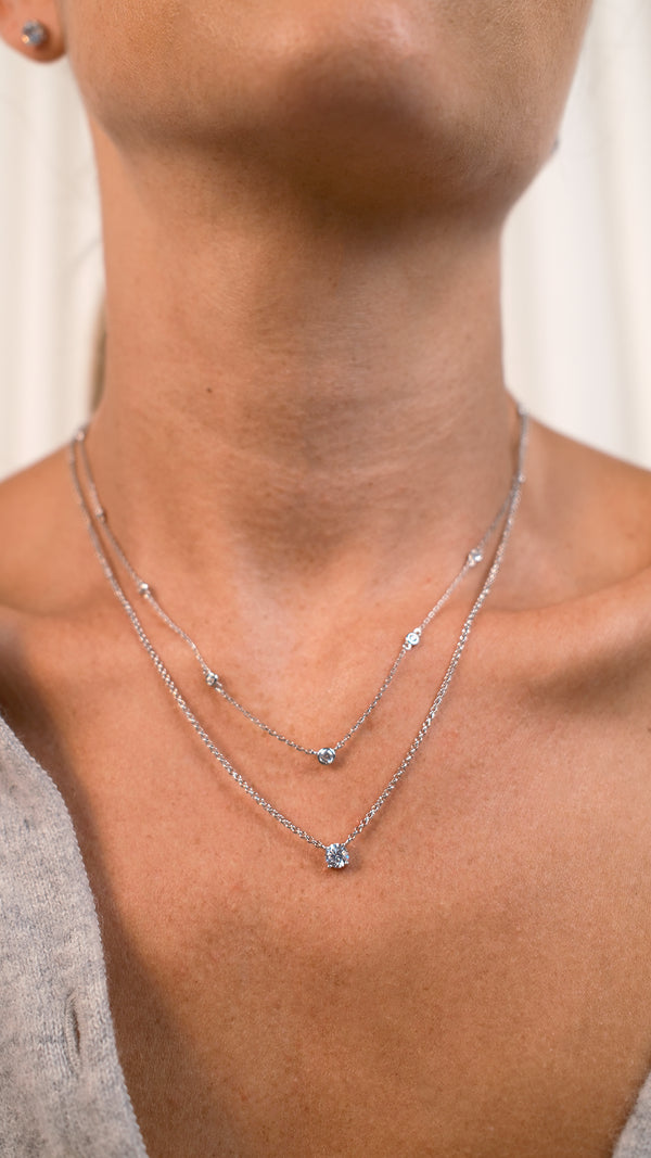 Sterling silver pre-layered necklace with a solitaire and a station necklace