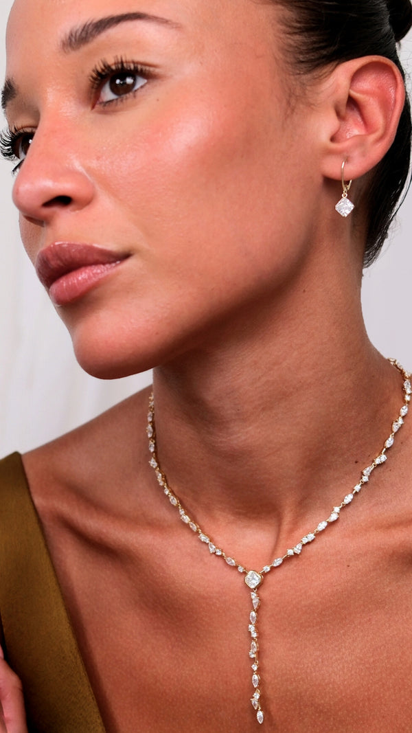 9K solid gold drop earrings with a classic princess stone silhouette.