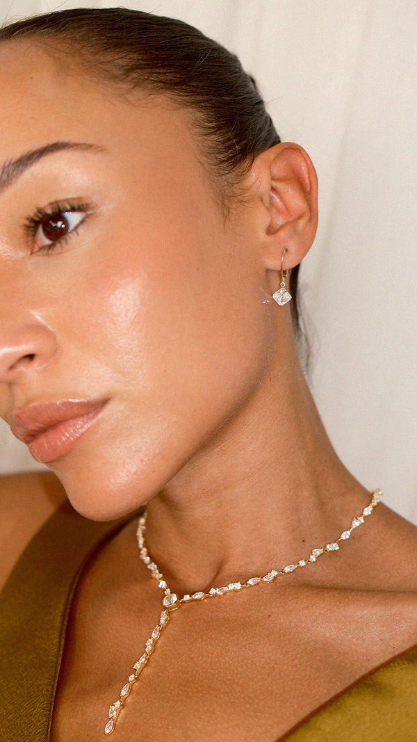 Classic gold vermeil princess cut staple earrings suitable for bridal or evening looks.