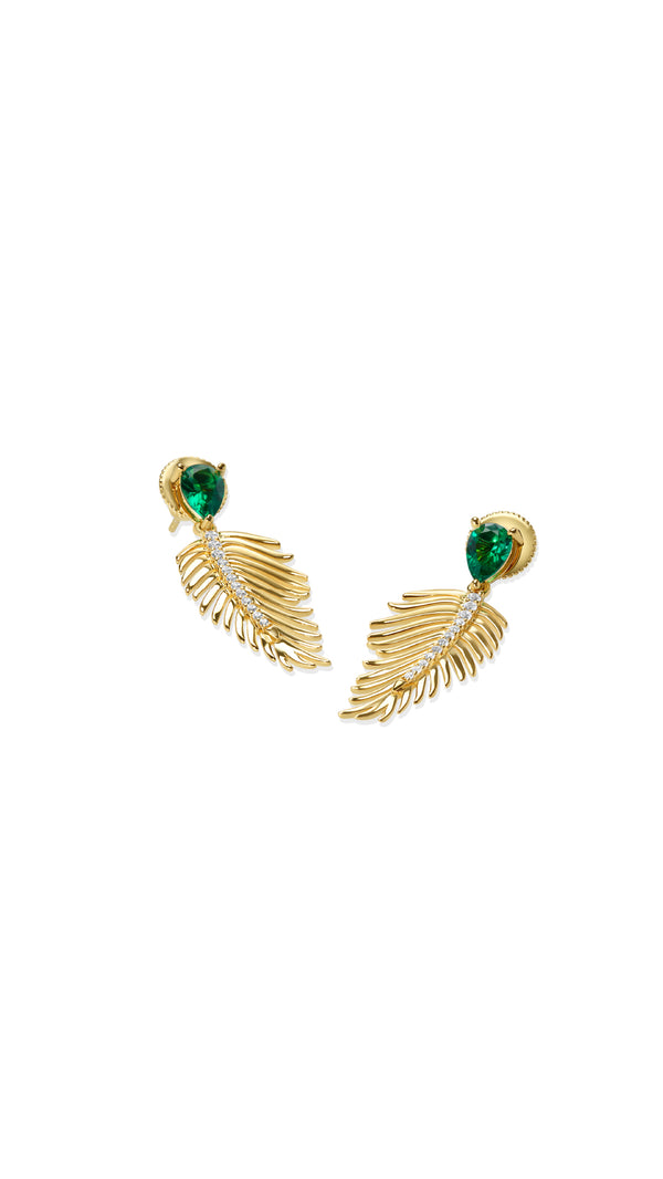 Gold leaf design earring for women with pear cut emerald gemstone.