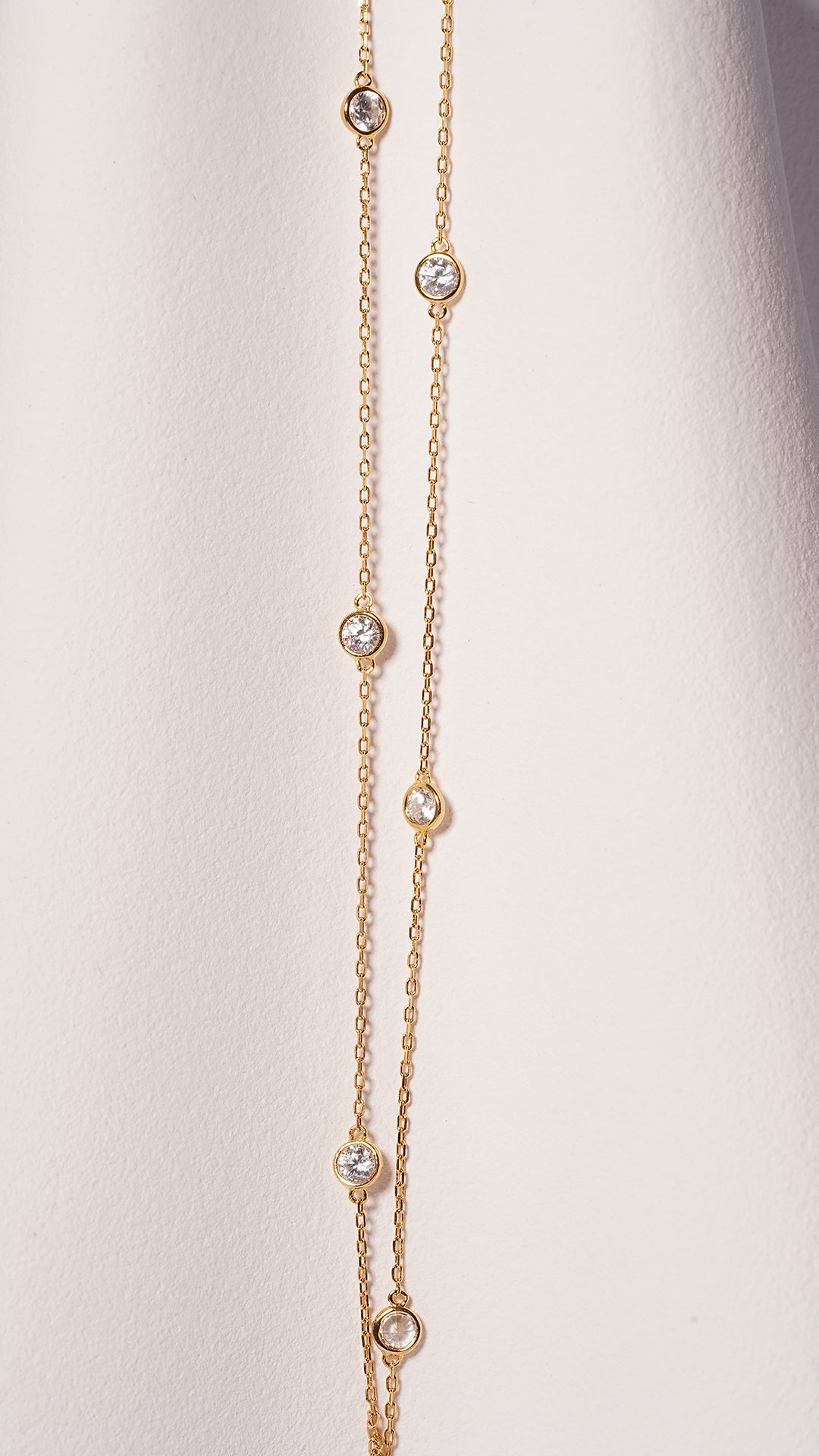 Petra gold vermeil station necklace with sparkling stones in doughnut bezels - CARAT* LONDON
