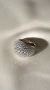 The Reese classic pave dome ring is crafted from sterling silver with a smooth, graduated pave finish and an elegant under-gallery for added sophistication.