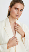 Delicate pear-shaped gemstone necklace in gold vermeil. Wear high on the neck with adjustable slider.