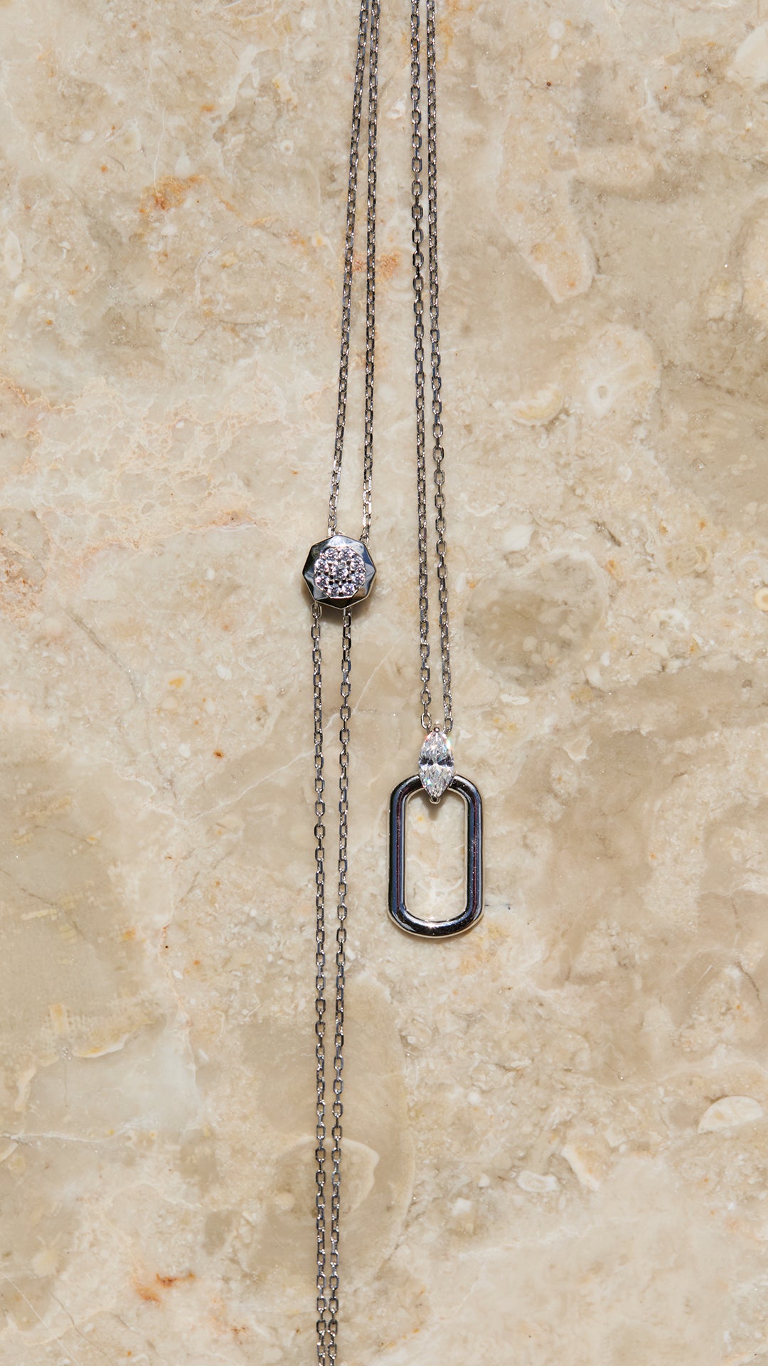 Sterling silver necklace with adjustable slider detailing.