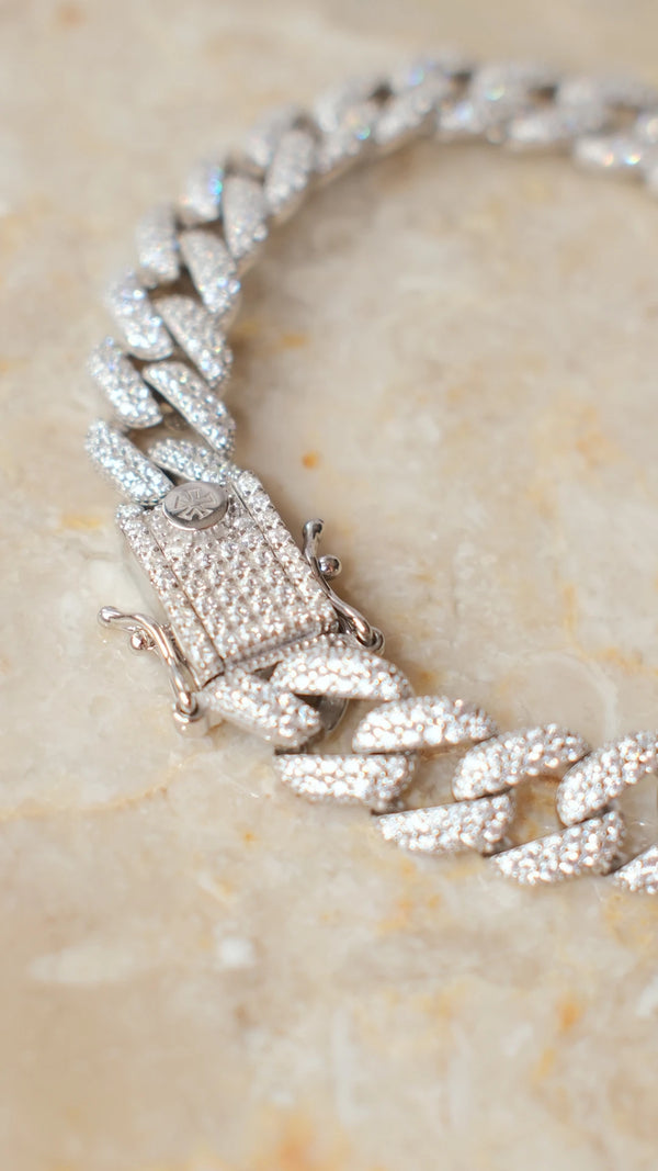 Macro shot of chunky silver Cuban links.