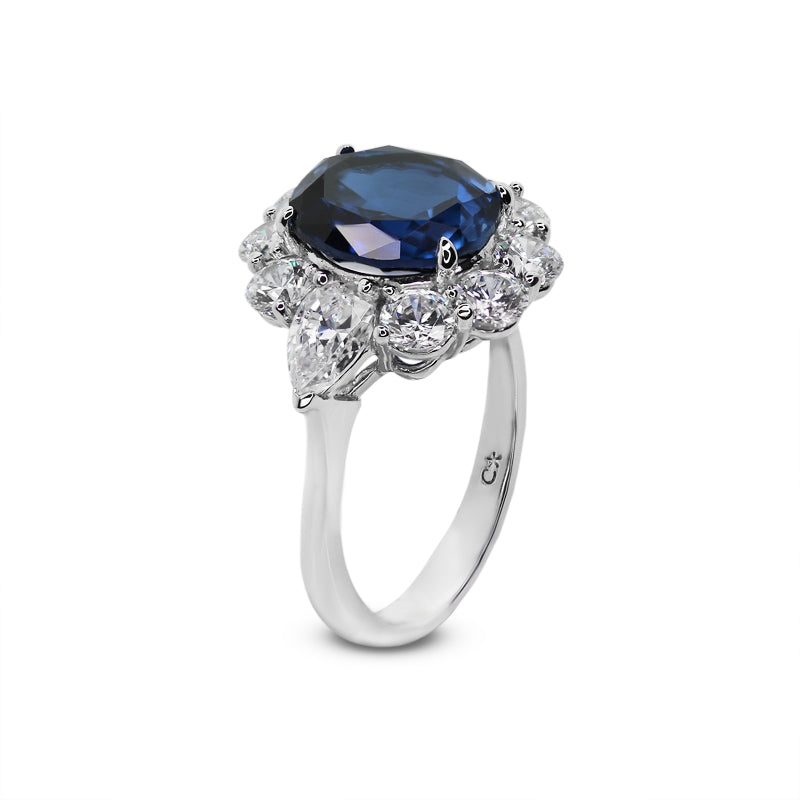 Sterling Silver Sapphire Ring - Sapphire encased with white stones