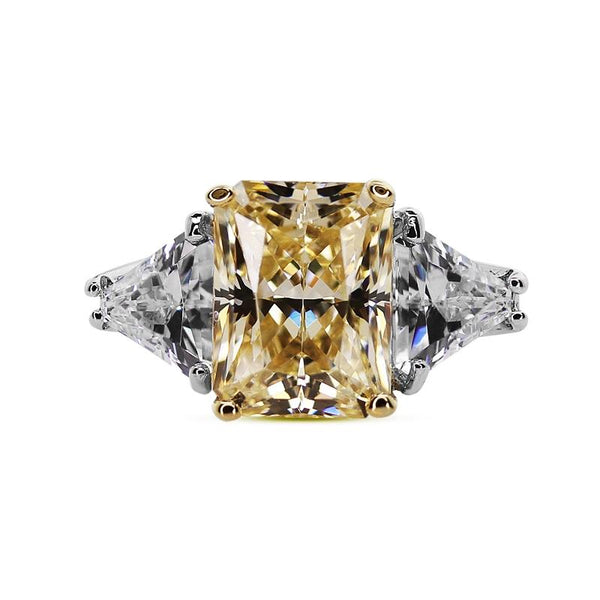 Radiant cut canary trilogy ring for women set in 9k solid white gold with triangular side stones. 