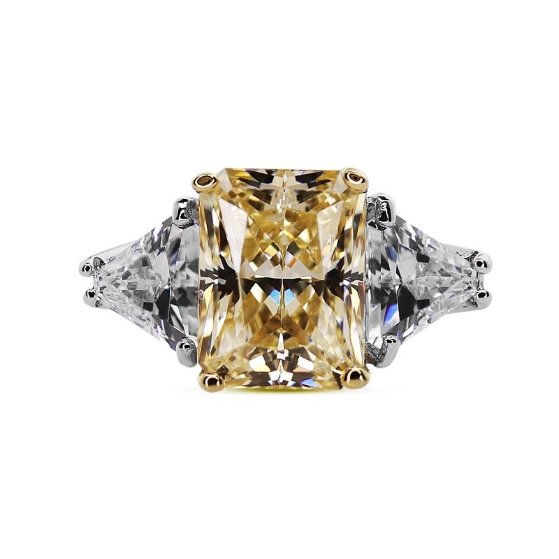Radiant cut canary trilogy ring for women set in 9k solid white gold with triangular side stones. 